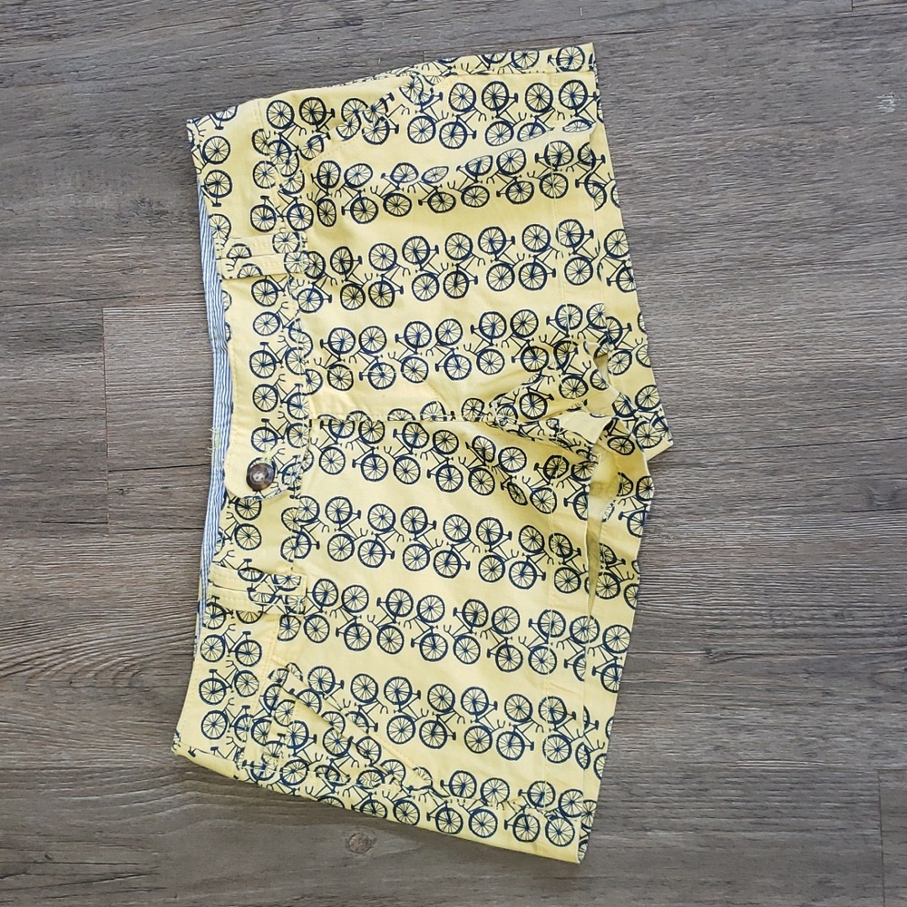 Red Camel womans yellow shorts with bike pattern est 1931